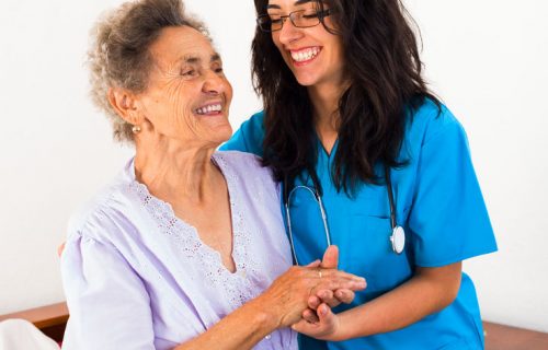 44325841 - happy nurses keeping good mood in nursing home.